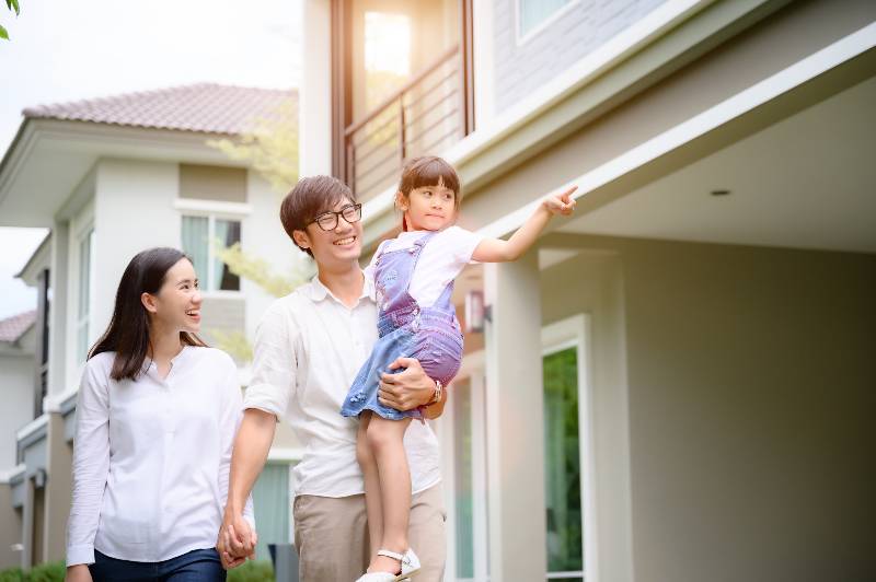 family walking on the model new house looking for living life future